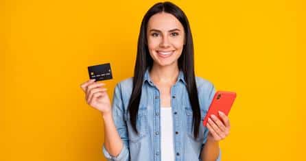 happy woman credit card 1